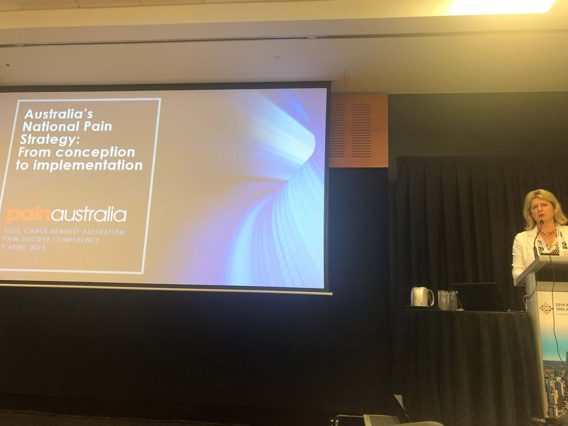 Carol Bennett presenting on the Australian National Pain Strategy at the APS Conference